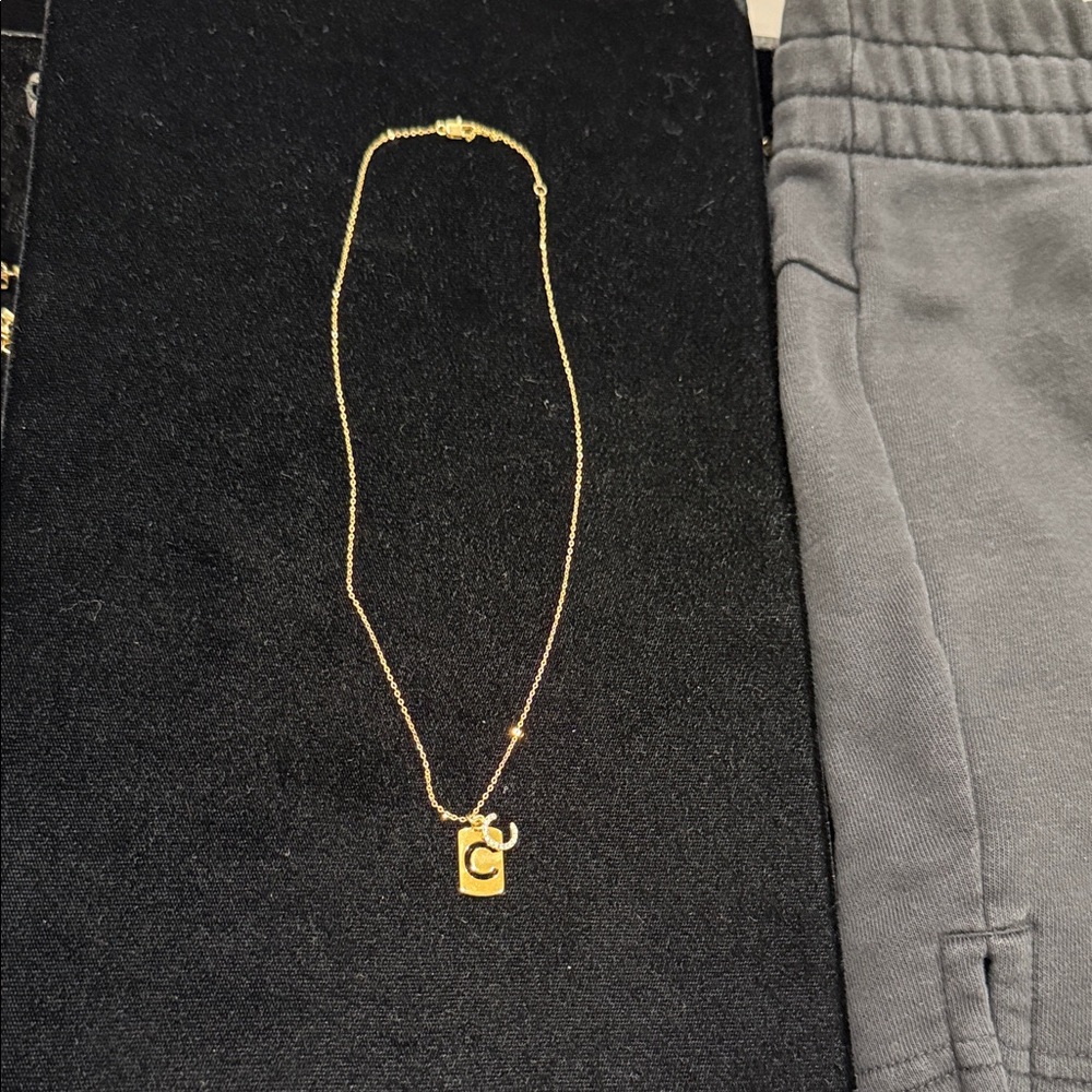 Gold tone Necklace with Pendant with C charm
